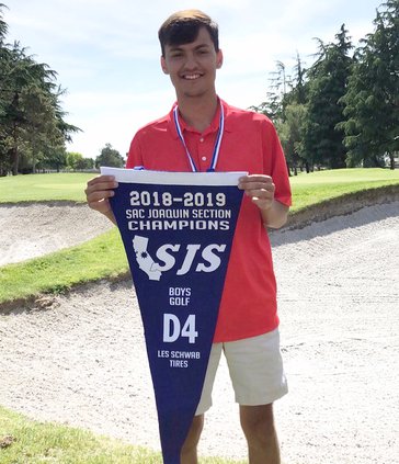 Gary Condit holding pennant